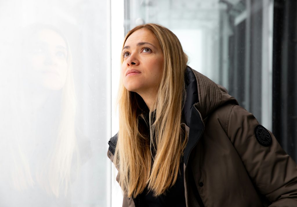 woman looking afar seasons change