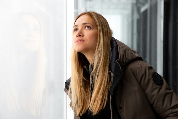 woman looking afar seasons change