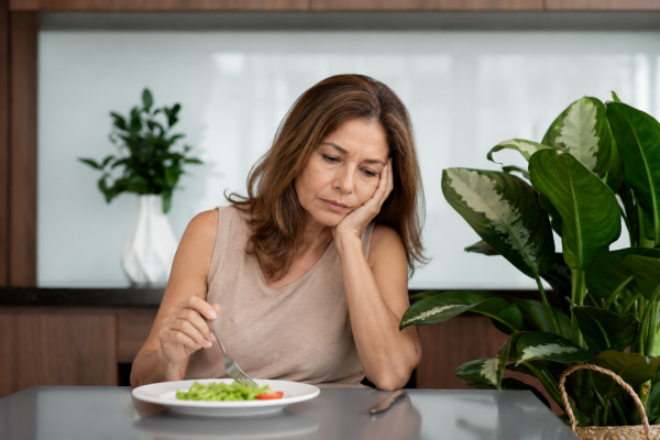 medium shot-midlife woman no appetite