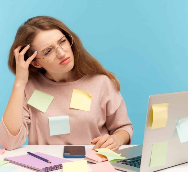 Forgetful woman with sticky notes